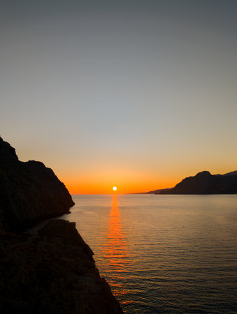 Sunset in the bay of Plakias on the Greek island of Creteの写真素材