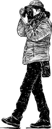 Sketch of a young man photographingのイラスト素材