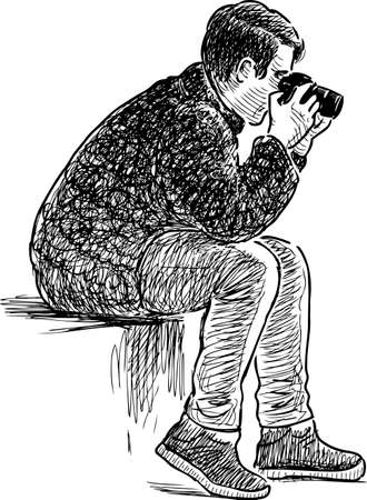 A young man sits and takes pictureのイラスト素材