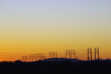 Power lines silhouette in front of Channel Islands, CAの写真素材