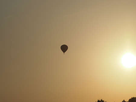 sunrise with hot-air balloonの写真素材