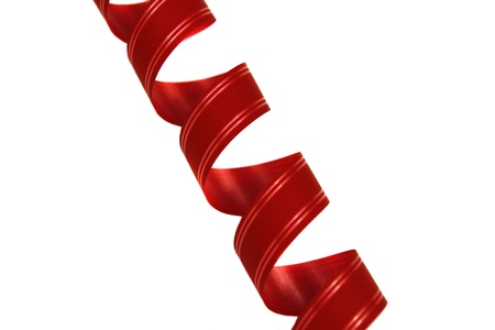 red curvy ribbon on white backgroundの写真素材