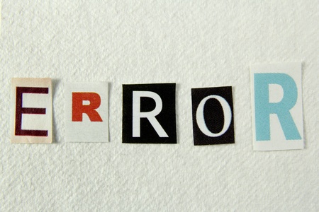 error cut from newspaper on handmade paperの写真素材