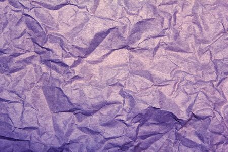 violet crumpled paper background の写真素材