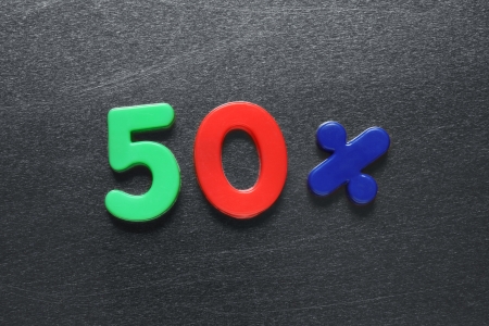 50 percent spelled out using colored fridge magnets の写真素材