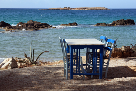 Restaurant near the beautiful turquise sea in Chania, Creteの写真素材