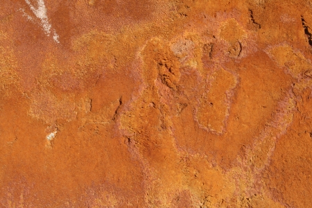 Weathered ginger stone wall