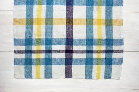  dish towel on white wooden table 