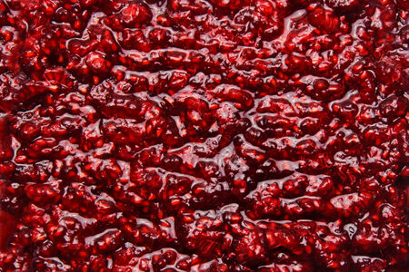 fruits background, closeup of crushed raspberries の写真素材