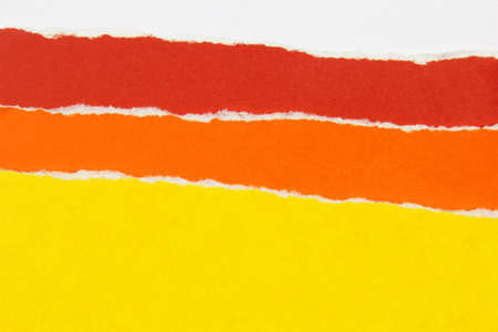 layers of colorful torn paper