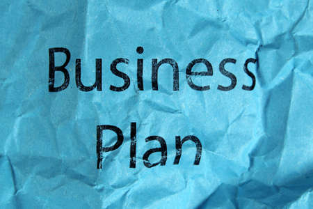 business plan on blue paperの写真素材