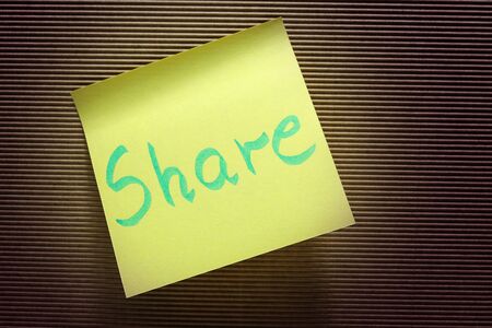 share text on yellow sticky noteの写真素材