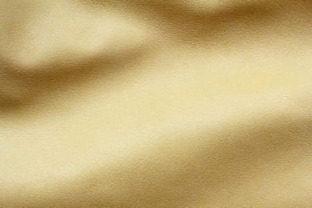 gold leather fabric wavy textureの写真素材