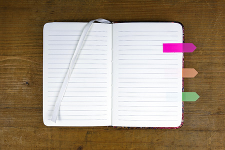 Open notebook with colorful tabs