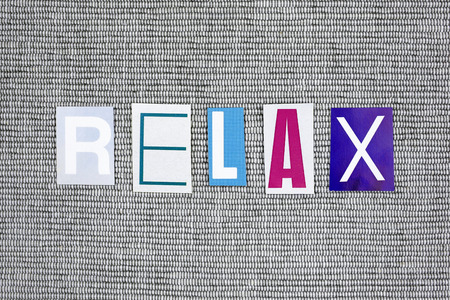 relax word on gray background