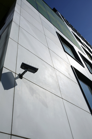 closeup of security camera on modern building