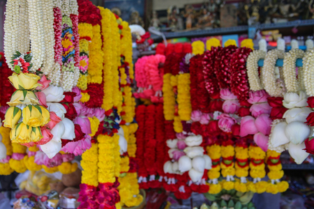 Indian colorful flower garlands for sales at street stallの写真素材