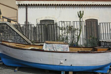 fishing boat in Catania, Sicily, Italyの写真素材