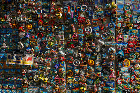 Syracuse, Sicily, Italy - november 10, 2019: many fridge magnets in a gift shop