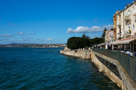Syracuse, Sicily, Italy - november 10, 2019: seaside promenade in Ortigia, oldest part of the beautiful baroque city of Syracuseのeditorial素材