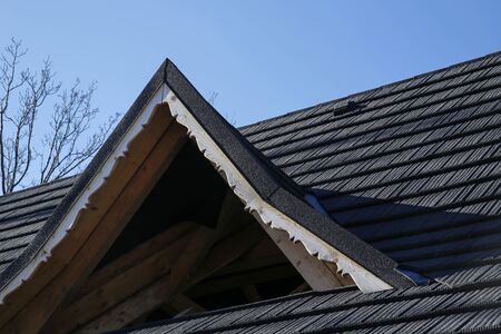 roof of modern wooden house being built