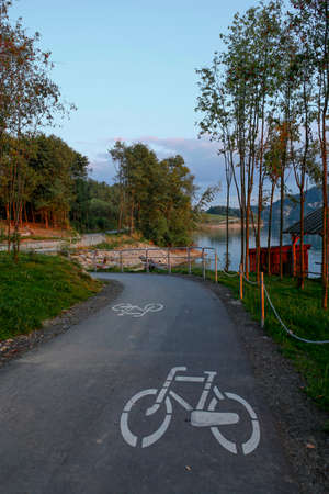 amazing empty bicycle road around the Czorsztyn Lake in Poland, during sunset