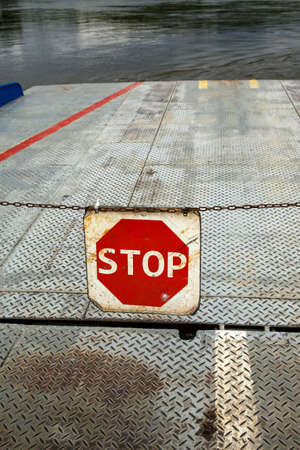sign stop on car ferry on the WisÅ‚a river in Poland
