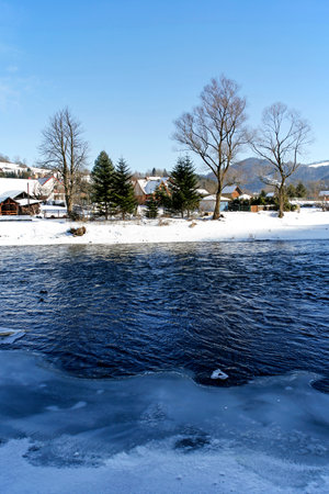 winter landscape of Dunajec river in Kroscienko, Pieniny Mountains, Polandの写真素材