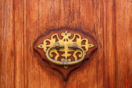 decorative rustic golden door knocker