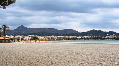 bay of Alcudia popular resort on Majorca, Spain at cloudy dayの写真素材