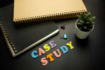 case study made with colorful felt letters on dark backgroundの写真素材