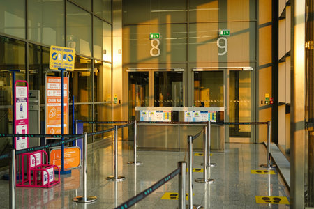 Balice Airport, Krakow, Poland - July 8, 2021: view of empty boarding gate in the departure hall...
