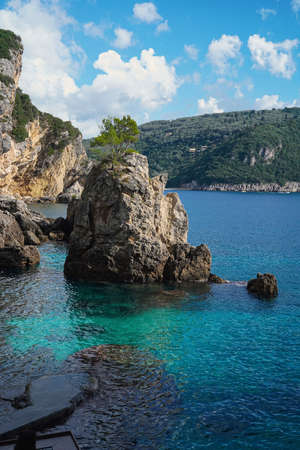 beautiful bay with rocky beach La Grotta in Paleokastritsa, Corfu island, Greece