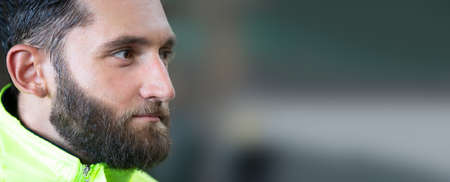 Engineer standing with confident against machine environment in factoryの写真素材