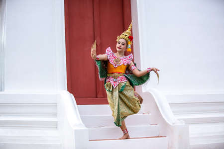 Beautiful Thai young woman portrait in Kinnaree traditional dress costume Art culture Thailand...