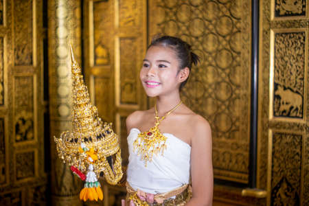 show practice of Thai dancing art with traditional student dress , Classical Dance. Children in Traditional Thai dancer costume,  Thailand.の写真素材