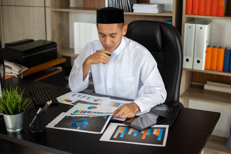 Business Muslim person using laptop in office.の写真素材