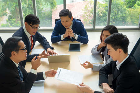 Multiethnic diverse group of business coworkers in team meeting discussionの写真素材