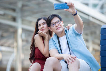 Couple love on summer vacation travel. Man and Woman walking on city romantic honeymoon, couple lover on travel concept.の写真素材