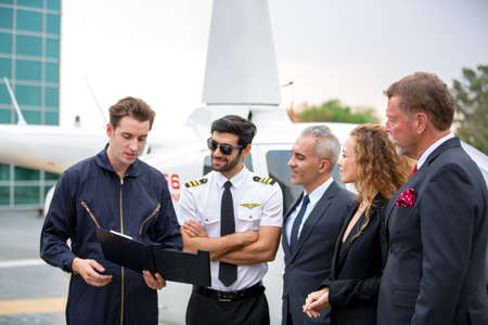 Technician report check of helicopter to pilot and helicopter service business owner