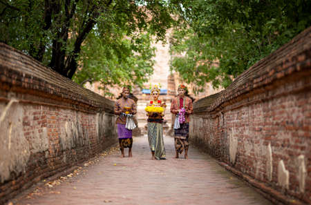 Hindu religious rite parade in 
 ancient temples of Bali, Indonesia.のeditorial素材