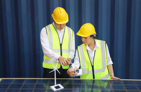 technicians install panels Solar cells to produce and distribute electricity. Energy technology...