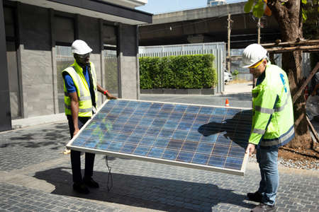 maintenance engineer, Solar energy systems engineer perform analysis solar panelsの写真素材