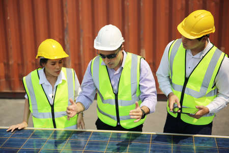 technicians install panels Solar cells to produce and distribute electricity. Energy technology...