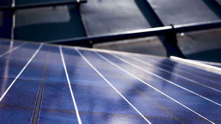 Eco technology for electric power., Aerial view of solar panels or solar cells on the roof in farm....