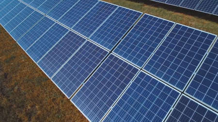 Eco technology for electric power., Aerial view of solar panels or solar cells on the roof in farm....