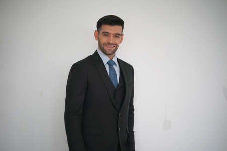 Professional actor preparation before shoot. Handsome young man applying by professional make up of visagist. Male makeupの写真素材