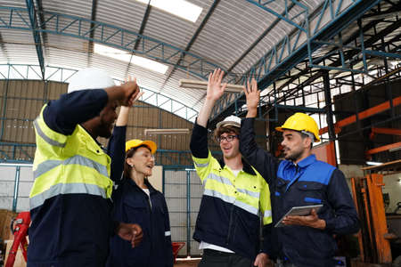 engineer checking control panel and teaching new Automatics robot arm and operating control machine...