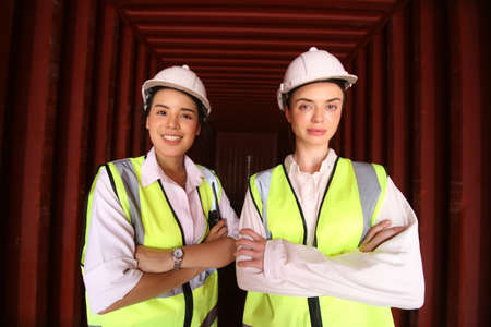 Foreman control Industrial Container Cargo freight ship at industry. Transportation and logistic.