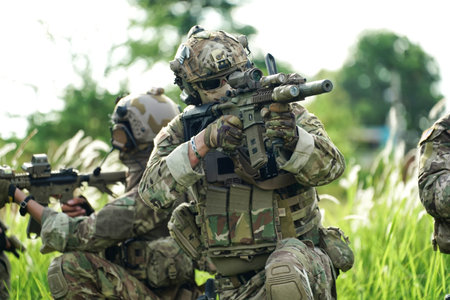 Infantry soldier shooting during military combat training.. Army elite troops marksman, special...